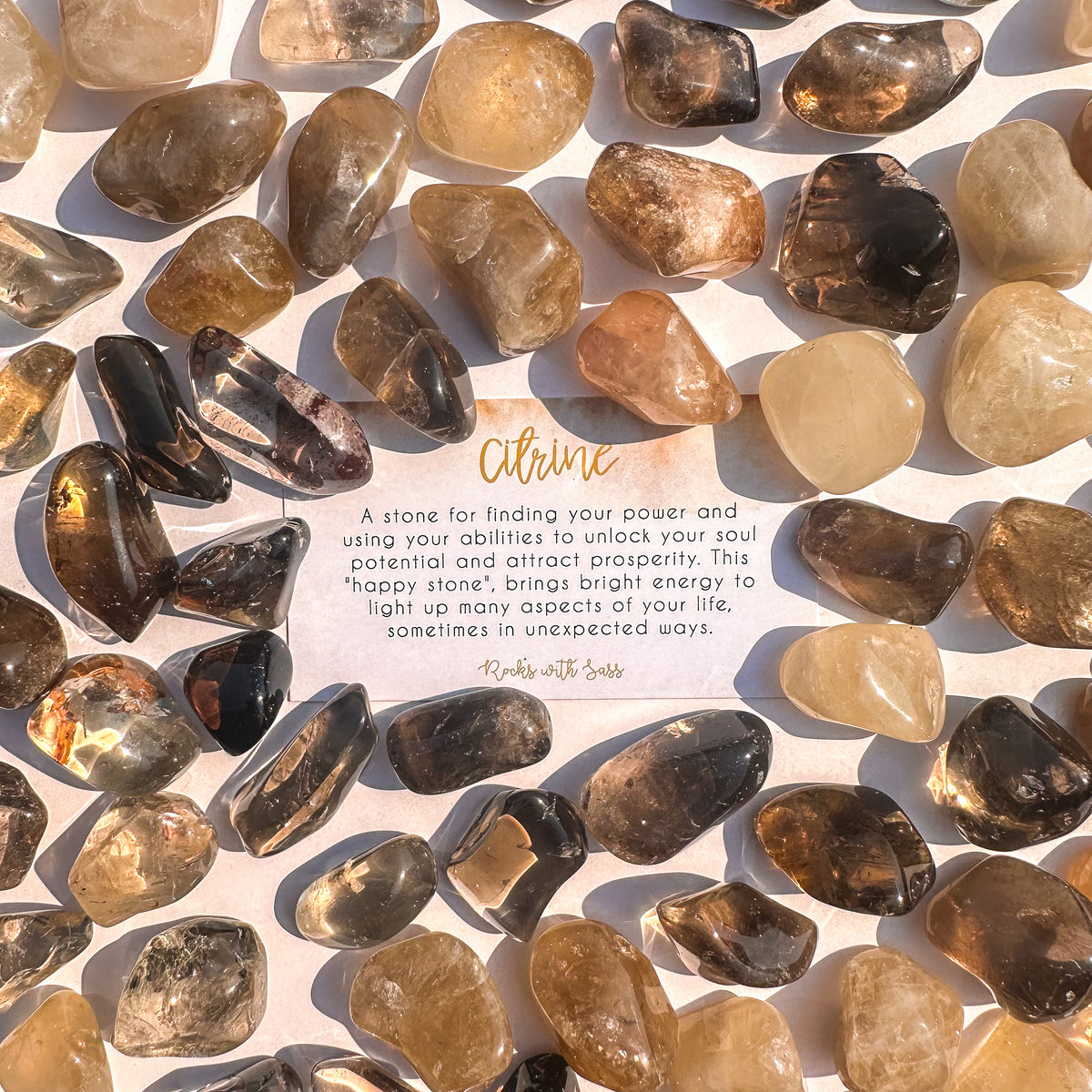 Small-sized natural Citrine tumbled pocket stone.