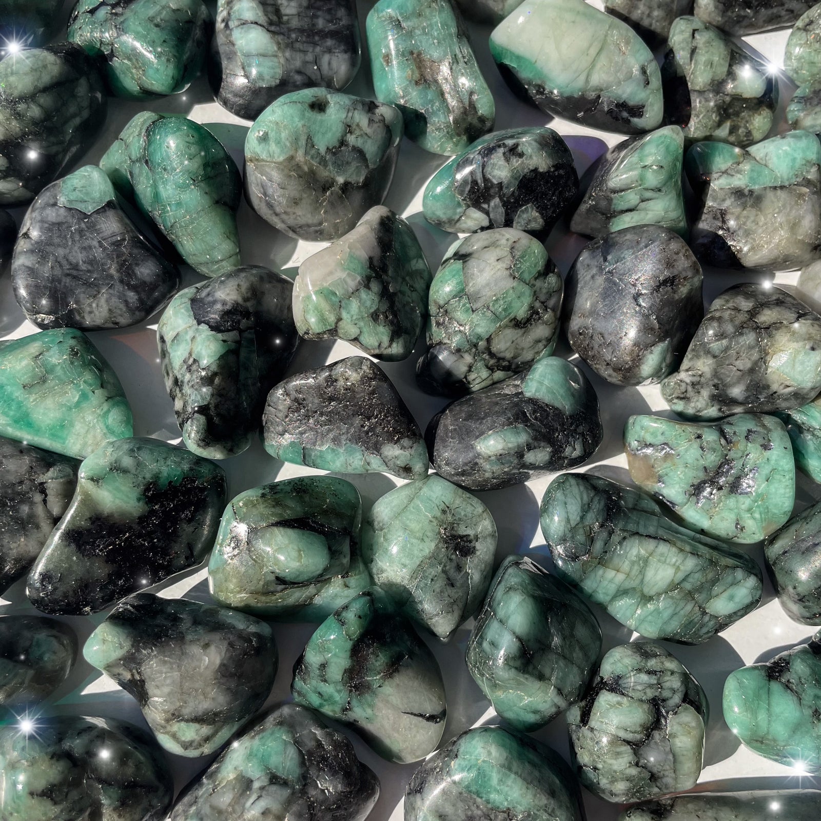 Small-sized Emerald tumbled pocket stone.