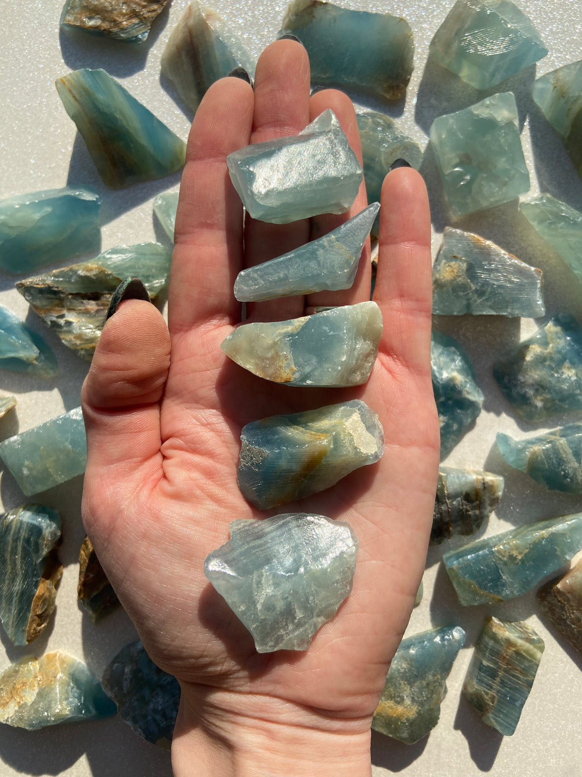 Lemurian Blue Calcite Pocket Stones