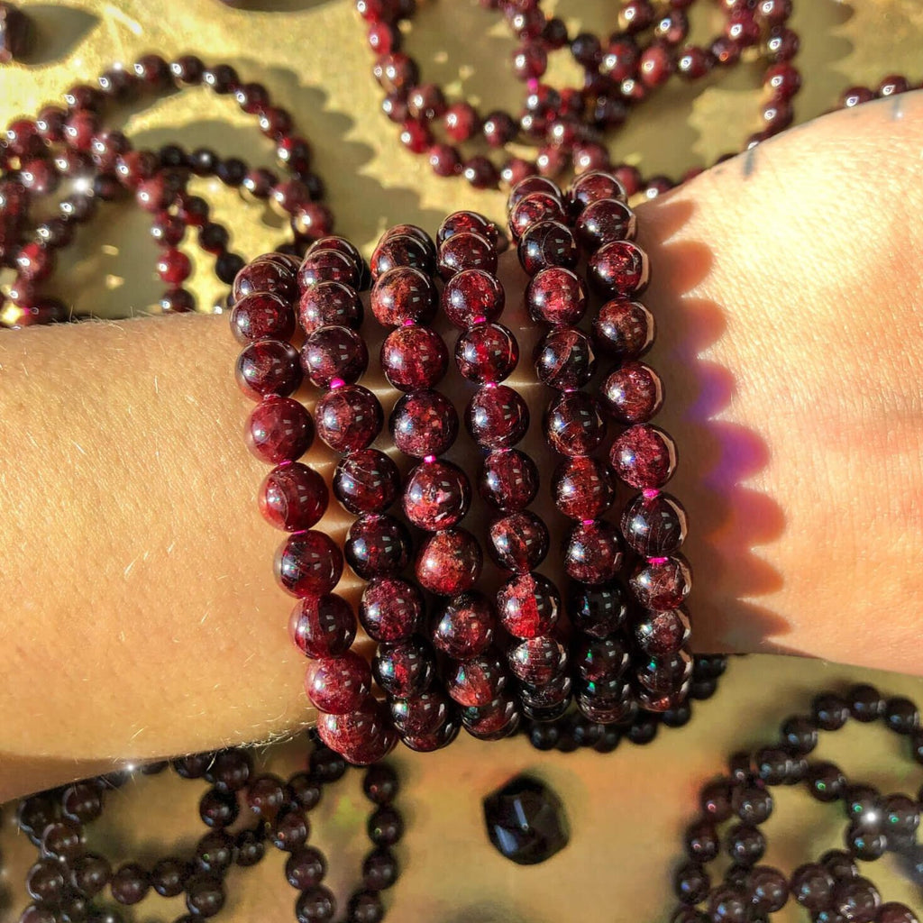 Garnet bracelet deals meaning