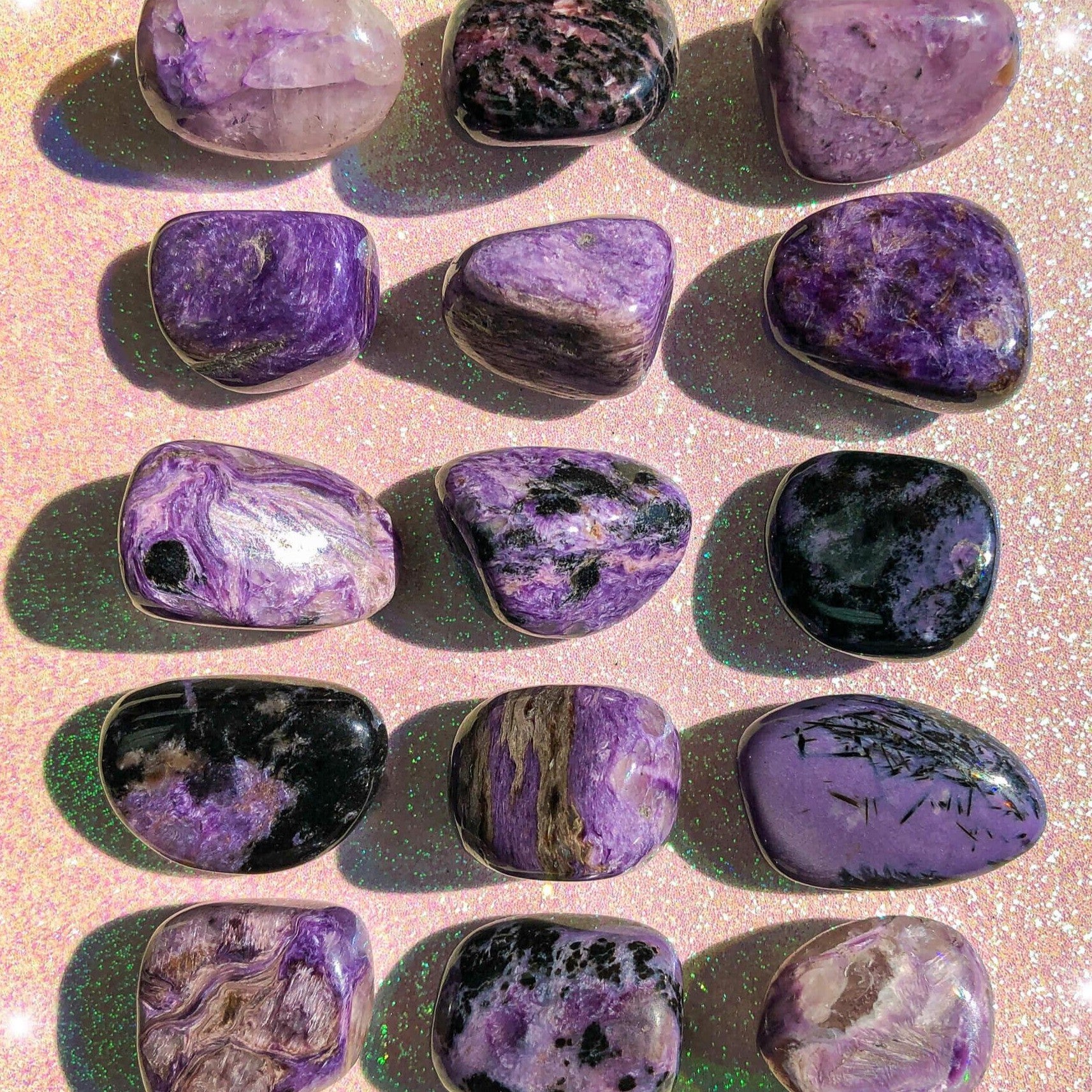 Small-sized Charoite tumbled pocket stone.