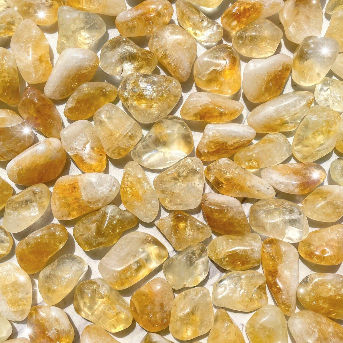 Small-sized + heat-treated Citrine tumbled pocket stone.