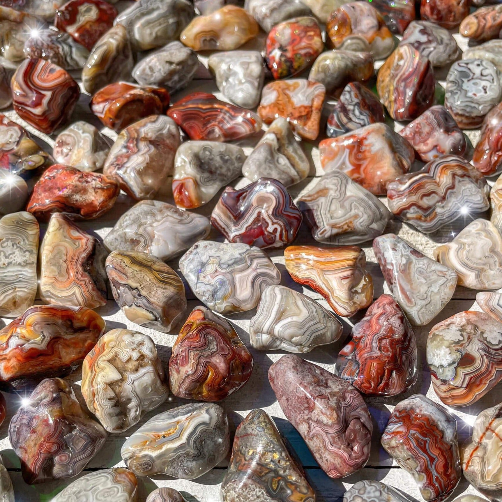 Small-sized Crazy Lace Agate tumbled pocket stone.